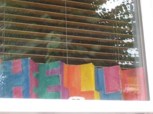 We still have some artworks on display in people's windows from 2015 - this one still looks as good as new and it sums up the welcoming spirit of Leytonstone. All bright and cheery!
